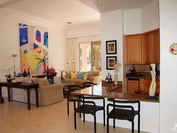 Wet Bar and Living Room with views to the backyard.