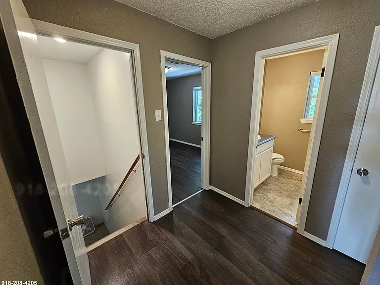 Hallway: basement stairs, bedroom #2, bathroom