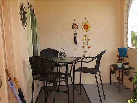 Large covered and screened in patio.
