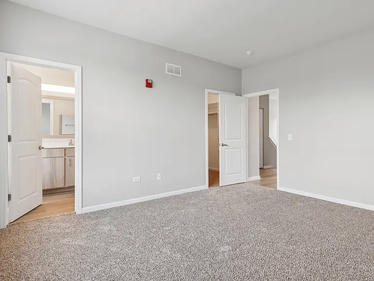 Davey Two Bedroom Townhome - large primary bedroom