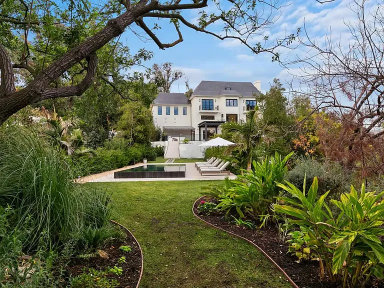 The California greenery is perfection alongside this French Chateau.