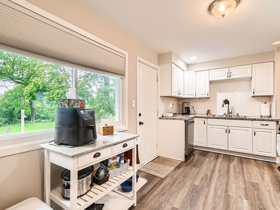 Granite countertops and tile backsplash.