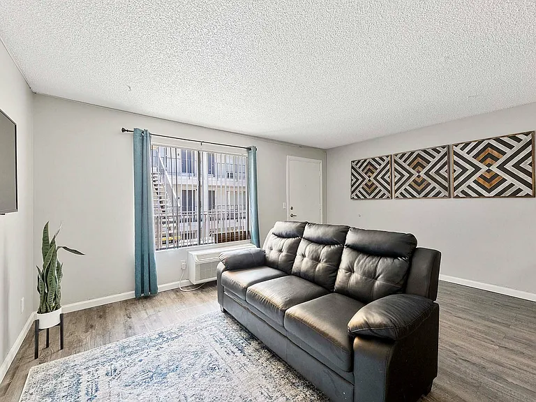 Step into comfort and style with this beautifully designed living room, perfect for relaxation and entertainment.