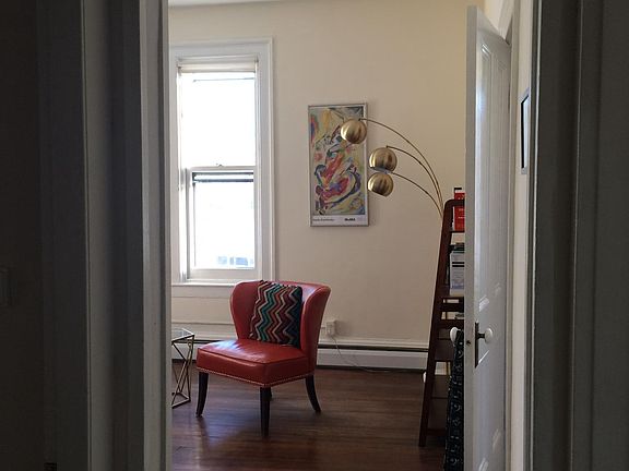 Entry to living room - high ceilings and lots of light!