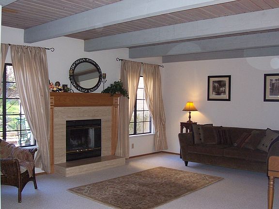 beamed ceilings, marble fireplace