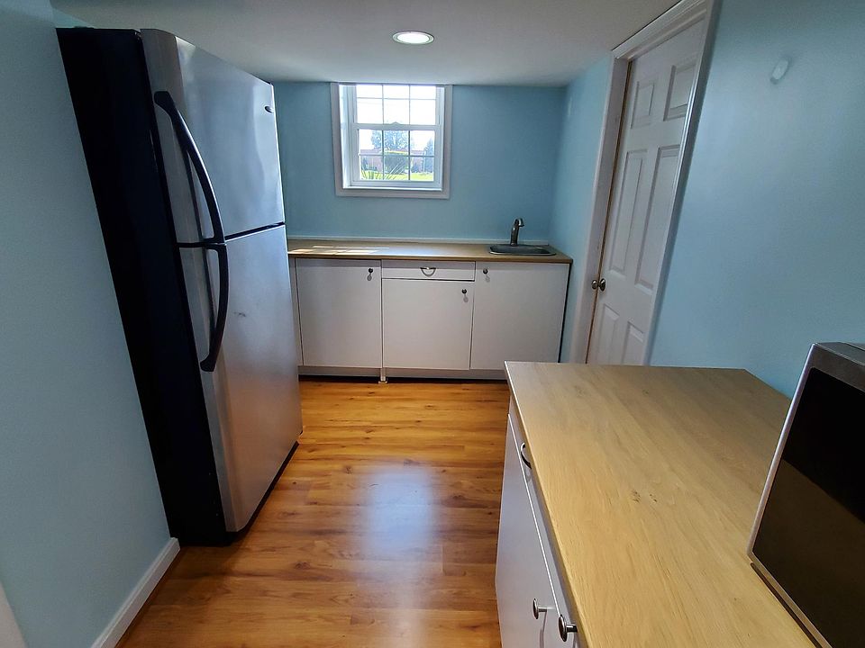 Kitchen -- with full size refrigerator (20 cf, 29" wide, stainless steel)