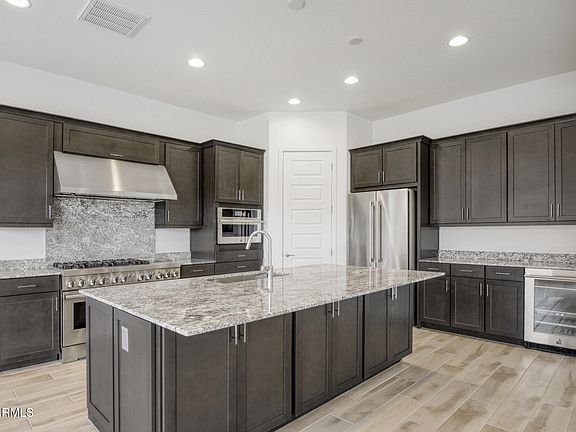 3rd image of 7942 W ROWEL Road