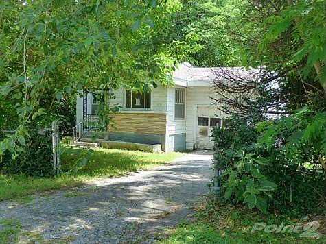 The house is set back off the street and has a great amount of privacy. Go to www.GSBOR.com for more