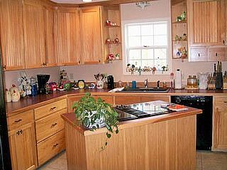 Custom cabinets, Jenn-air range in center island.