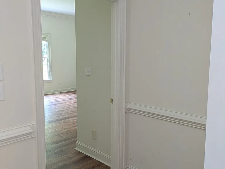 View from Foyer into Primary Bedroom.