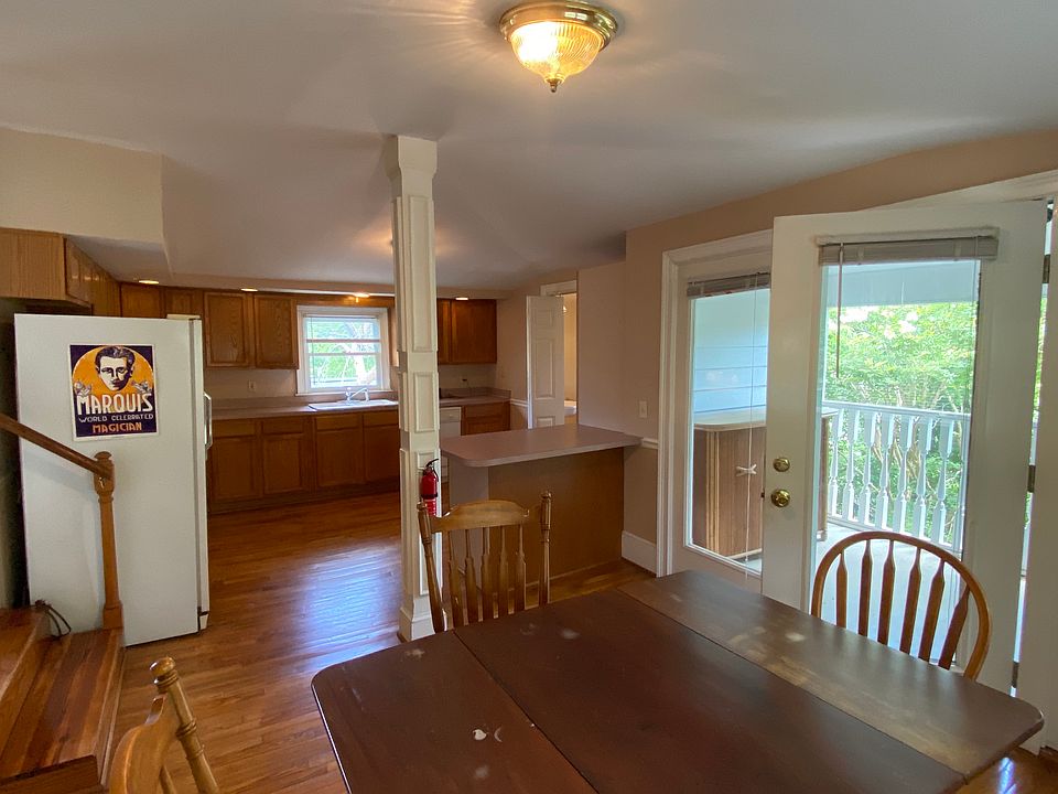 Dining area with porch, view to kitchen