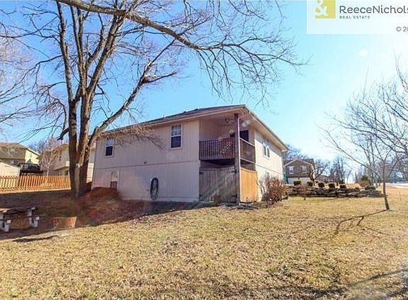 Back of Home - View of Covered Deck and Private Patio