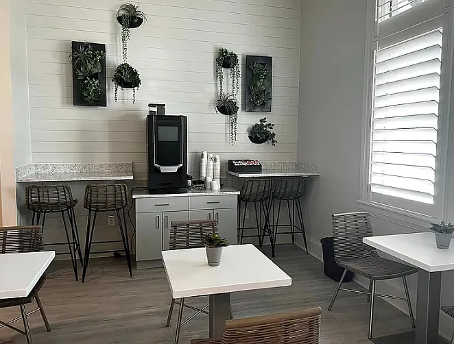 Coffee lounge offering complimentary coffee/espresso