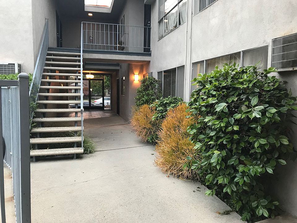 Private Courtyard, behind Glass Entry Doors~ Beautifully maintained. Privately owned and managed.