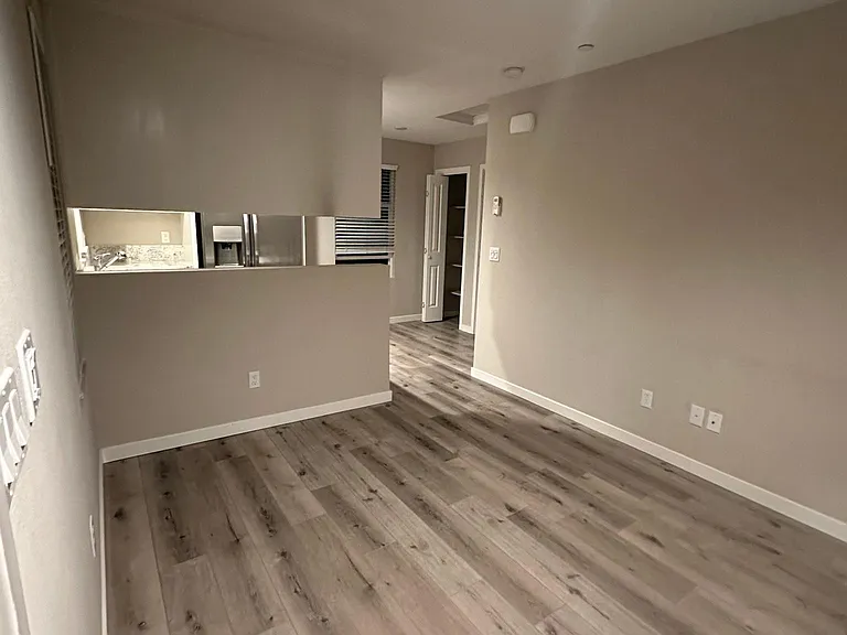 Livingroom looking at kitchen