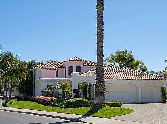 This light and bright 3 bedroom, 3 1/2 bath home features two master suites - one of them is located