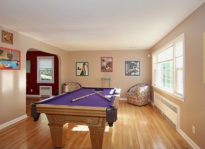 Sun Drenched Living Room w/Hardwood Floors