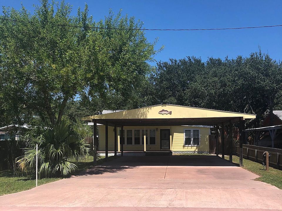 Large driveway. Large carport