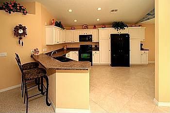 Gorgeous White Solid Wood Cabinetry in Kitchen!