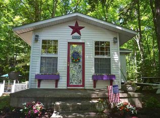12834 Manitou Trl, Kewadin, MI 49648