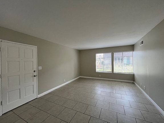 Smooth ceilings and tile flooring