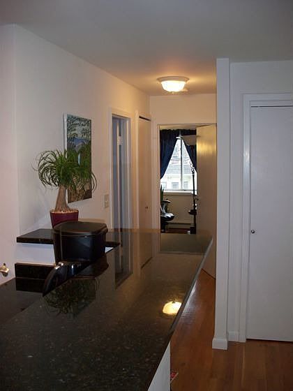 breakfast bar and hallway, looking into bedroom