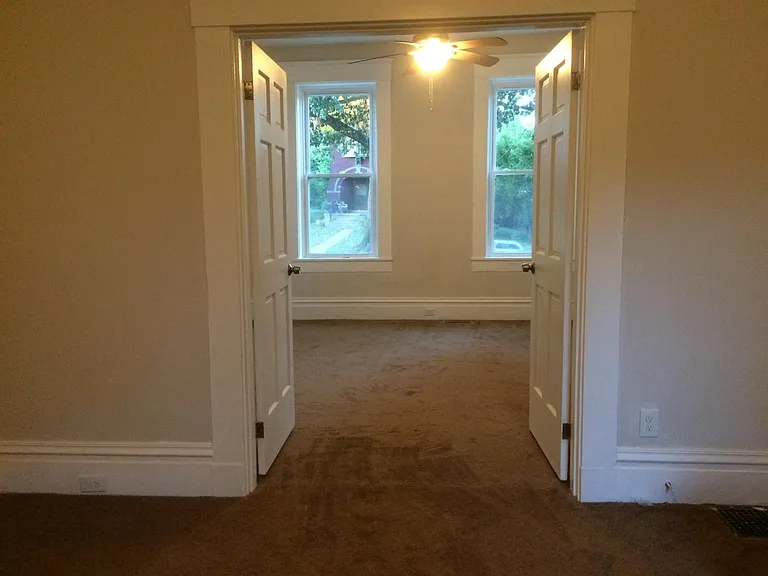 View from living room into main bedroom.