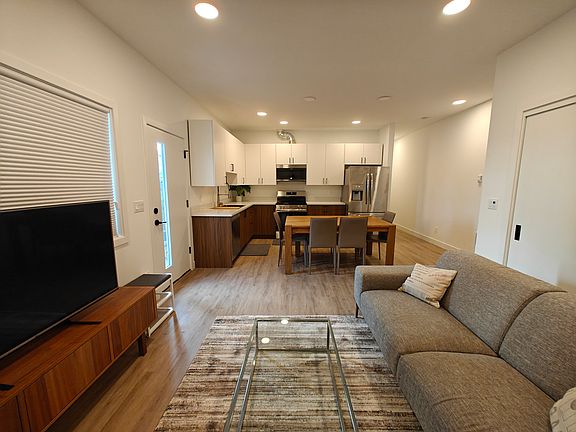 Living room with 55" LCD LG TV.