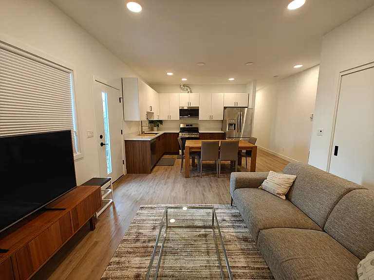 Living room with 55" LCD LG TV.