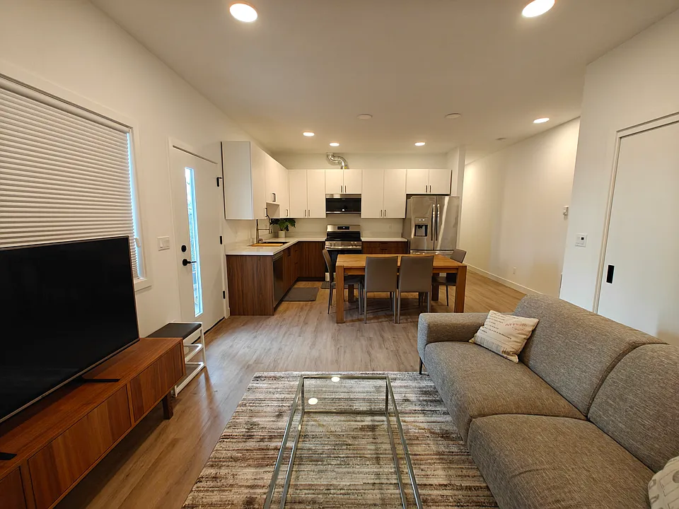 Living room with 55" LCD LG TV.