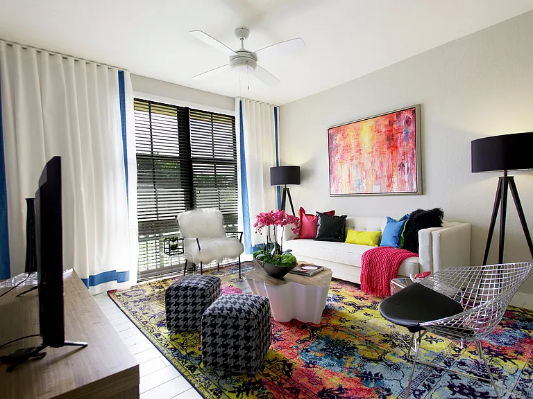 Our nice living room with windows and a ceiling fan. AMLI Dadeland