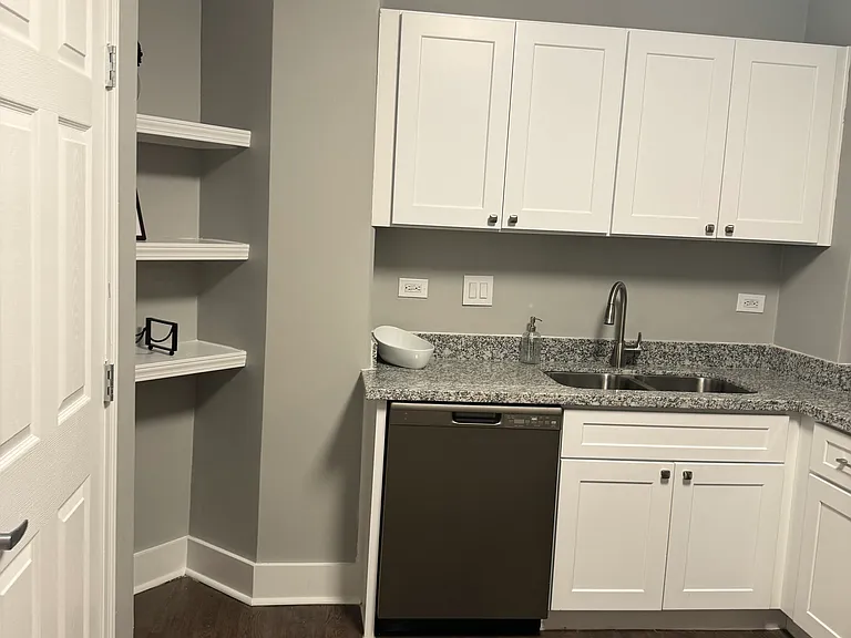 C- Floor plan Kitchen shaker style cabinets with great storage room. Washer and dryer in closet.