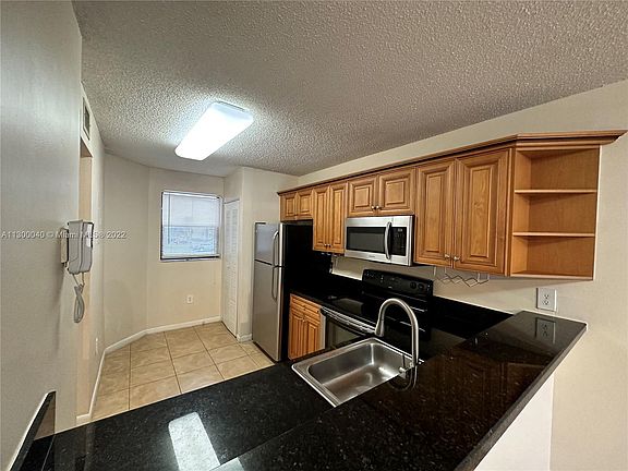 2nd image of 9921 Nob Hill Pl #9921