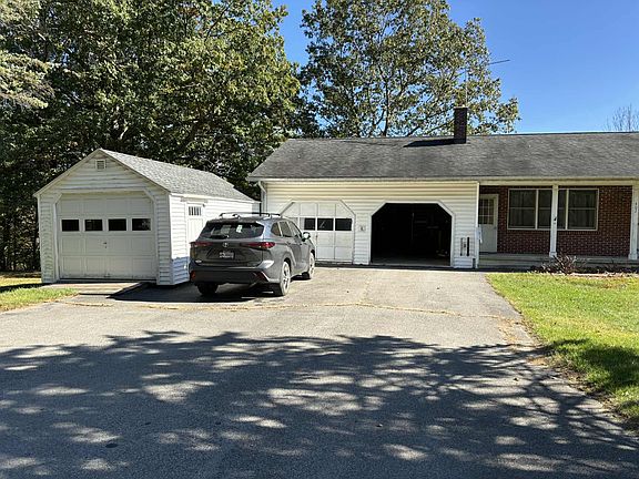 Front of house with detached garage