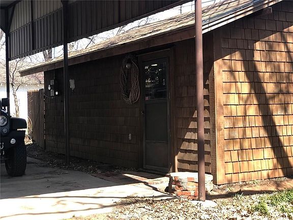 Large shop in back with private drive, also has overhead door and people door. Great Shop!