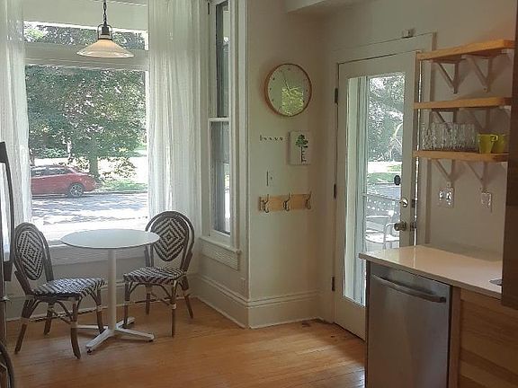 Enter from the wrap around porch into the newly remodeled kitchen with a south facing window eating nook.