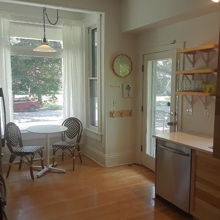 Enter from the wrap around porch into the newly remodeled kitchen with a south facing window eating nook.