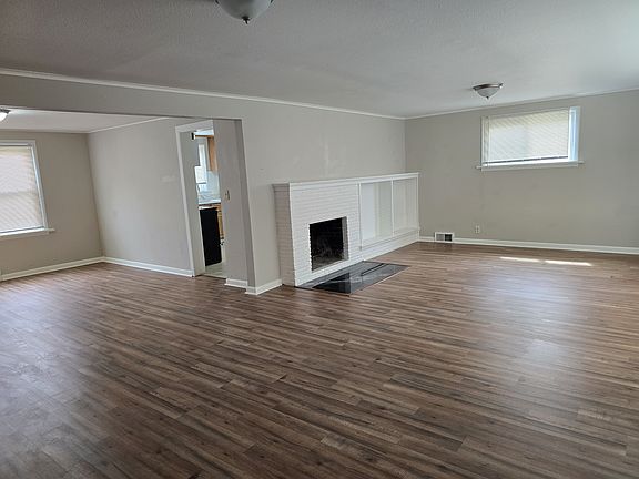 Living and dining areas have new flooring.