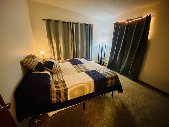 Cozy night time bedroom.