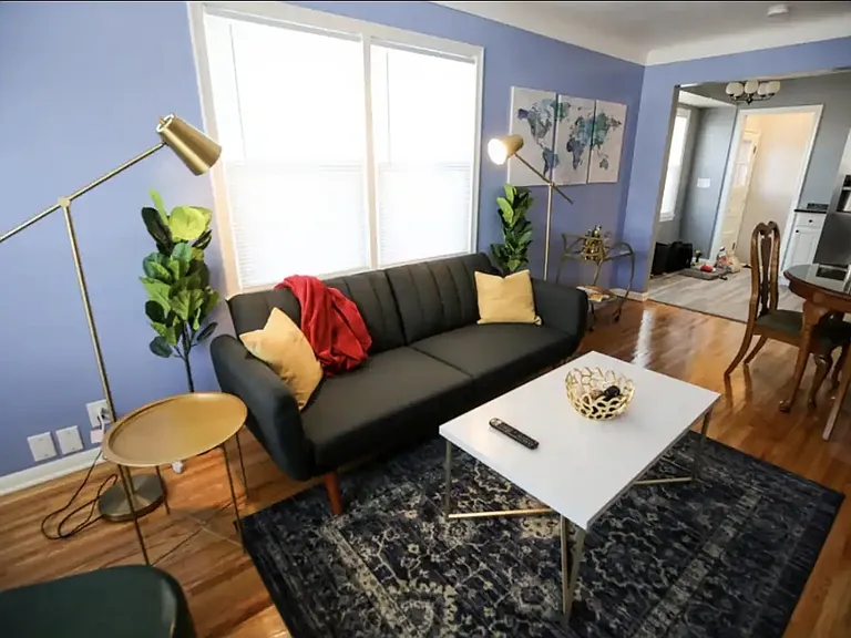 Living Room with well lit lamps and overhead ceiling lights