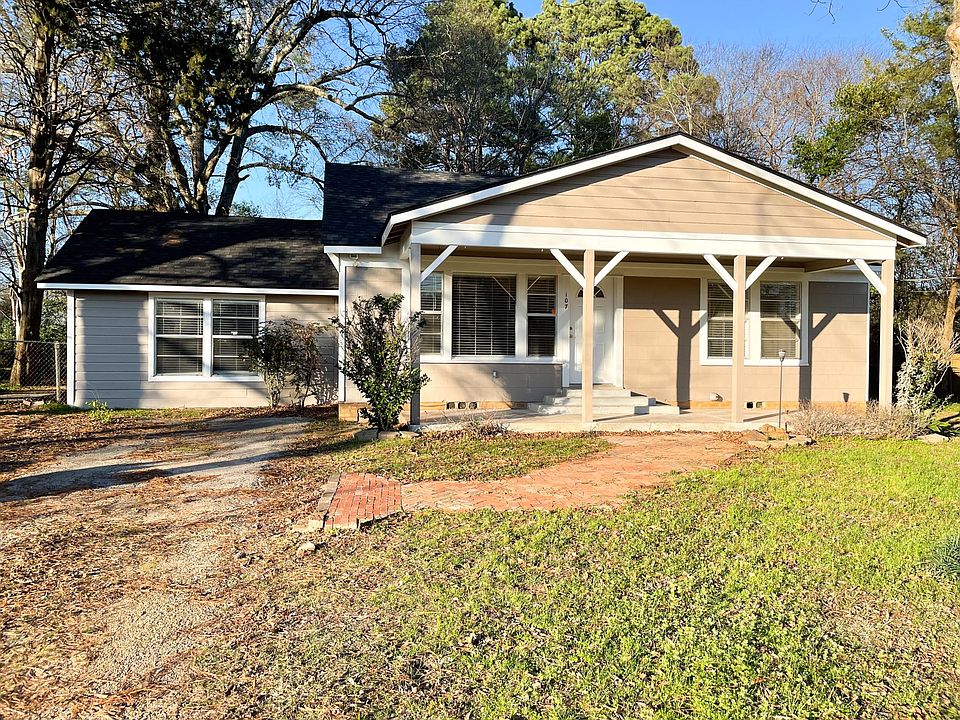 Front of house with parking to the left