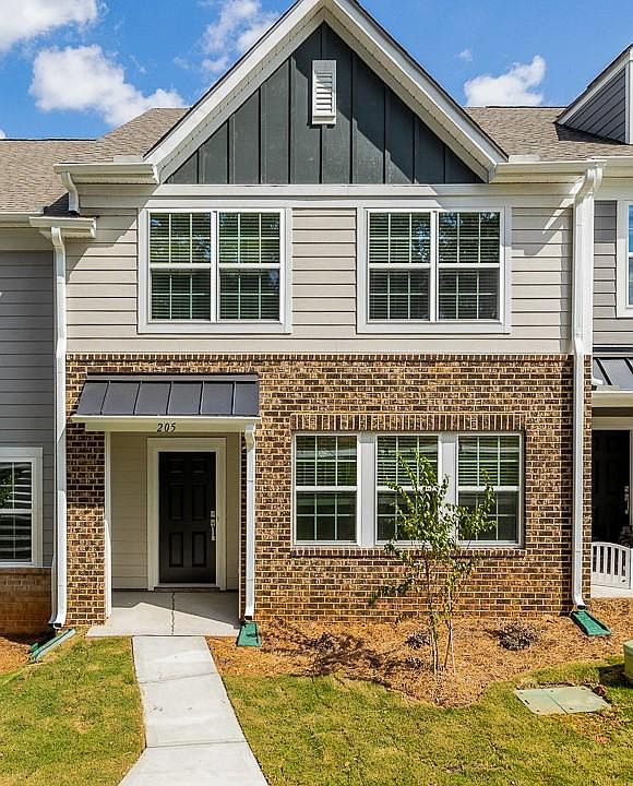 Front of home featuring beautiful brick exterior.