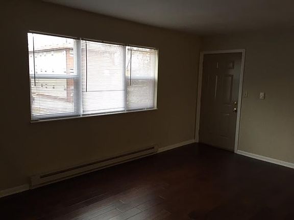 Living room. Apartment has replacement windows throughout.