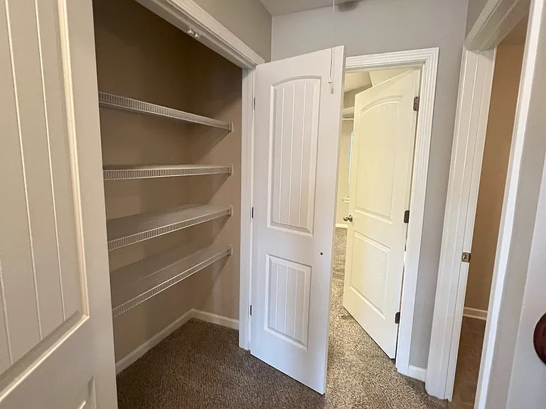 Master bedroom straight ahead. Laundry room to the right.