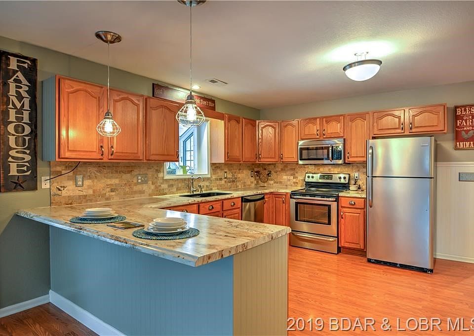 Updated kitchen with new counter tops and appliances.