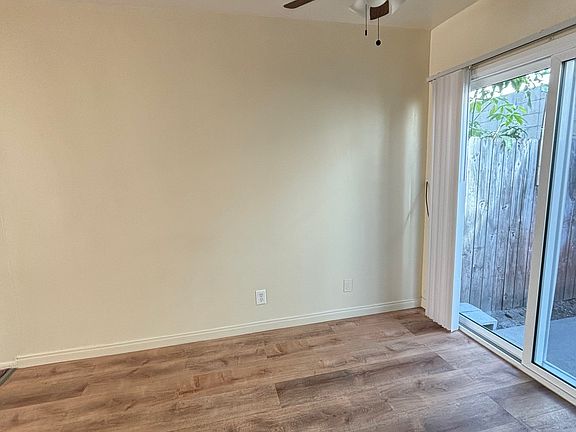 New plank floor in dining area and kitchen. New sliding glass doors to your own private patio