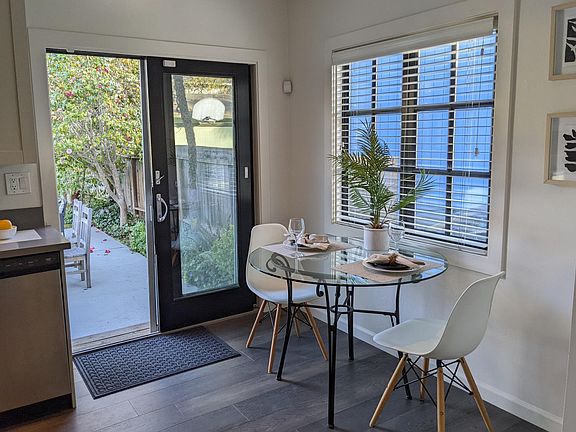 Dining area + backyard entrance
