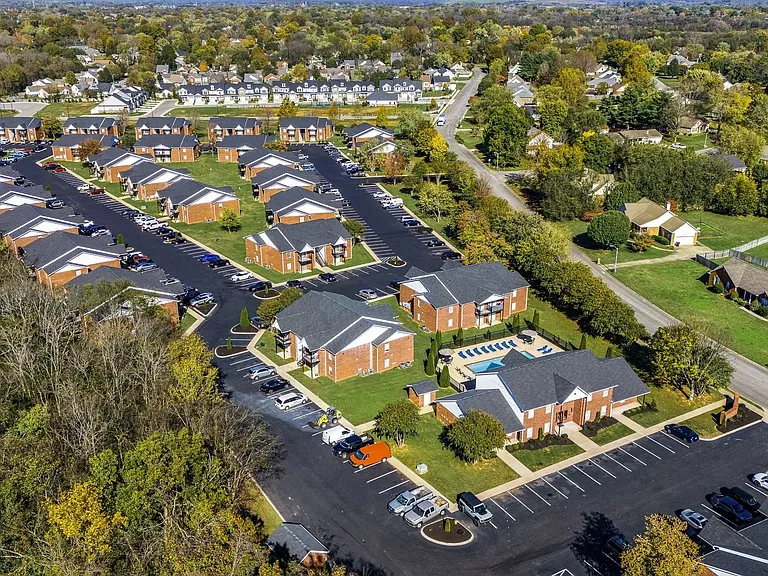 A bird's eye view of Saddlebrook Apartments in Murfreesboro TN and a swimming pool.