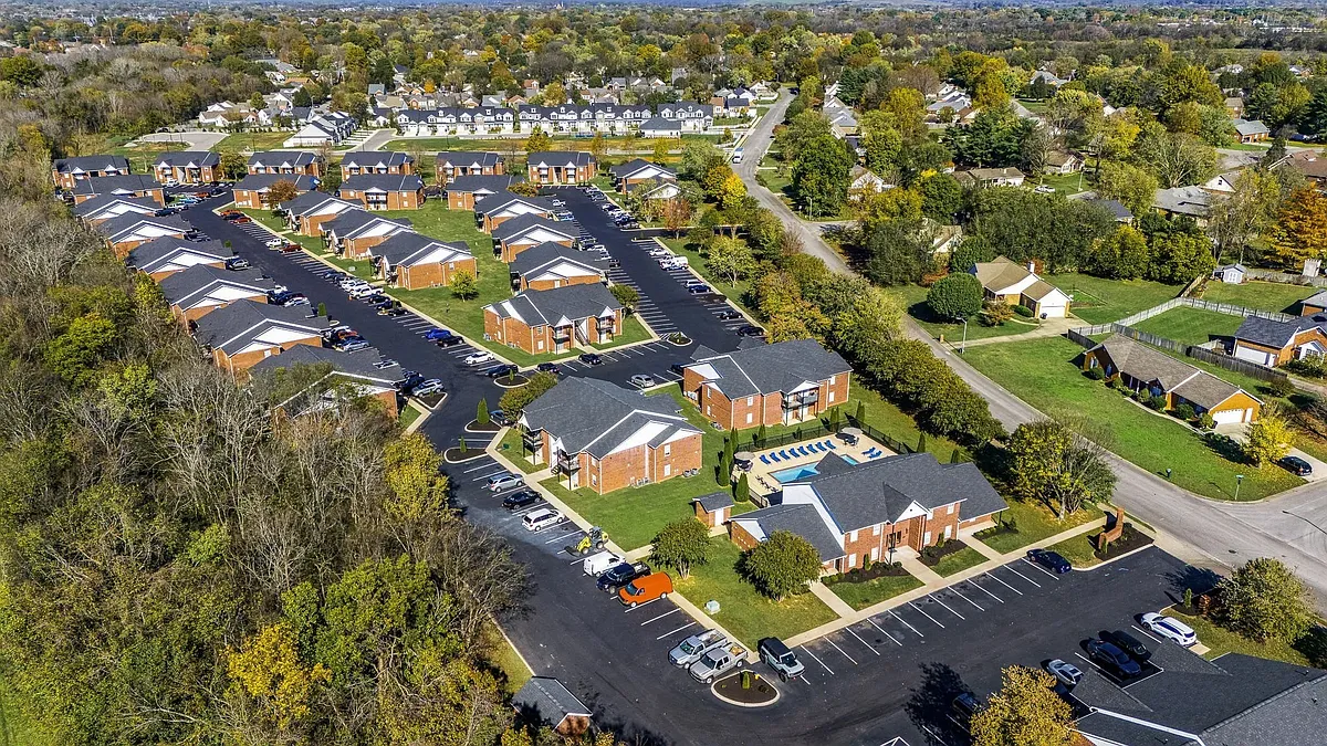 A bird's eye view of Saddlebrook Apartments in Murfreesboro TN and a swimming pool. - Saddlebrook Apartments