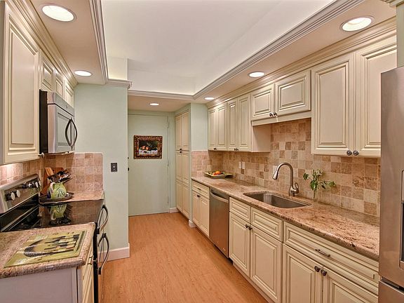 Kitchen with washer and dryer unit